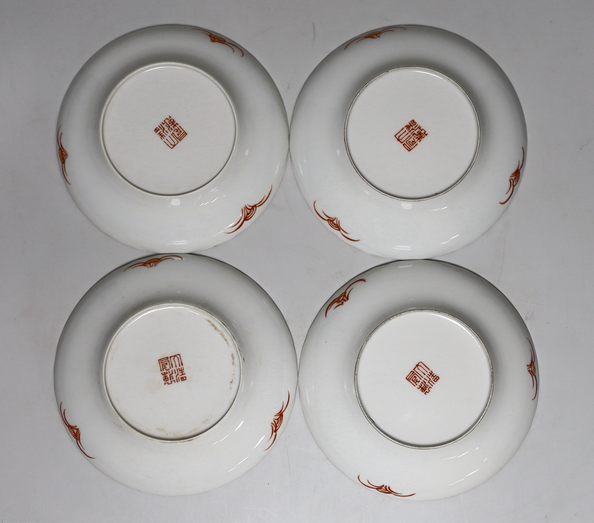 A set of four Chinese enamelled porcelain saucers, 13cm